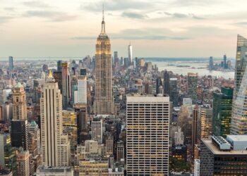 Panorama view of new york city skyline and skyscrapers at sunset