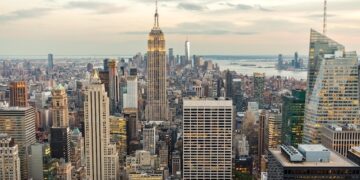 Panorama view of new york city skyline and skyscrapers at sunset