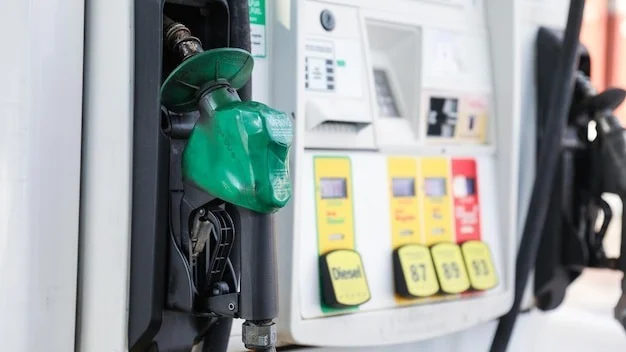 gas pump nozzle with rising numbers on the display symbolizing inflation and escalating gas prices